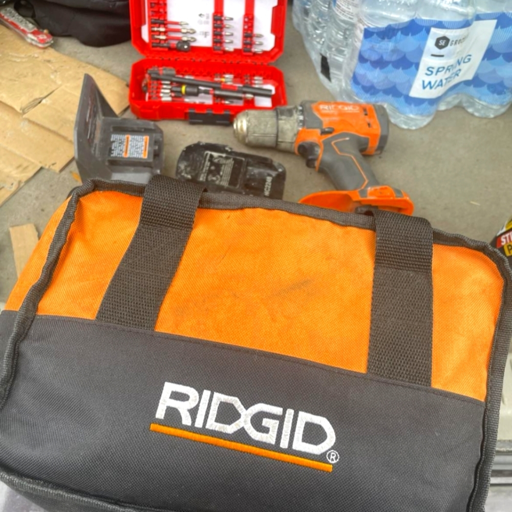 Ridgid 18v drill bag battery charger and Milwaukee drill bit set included